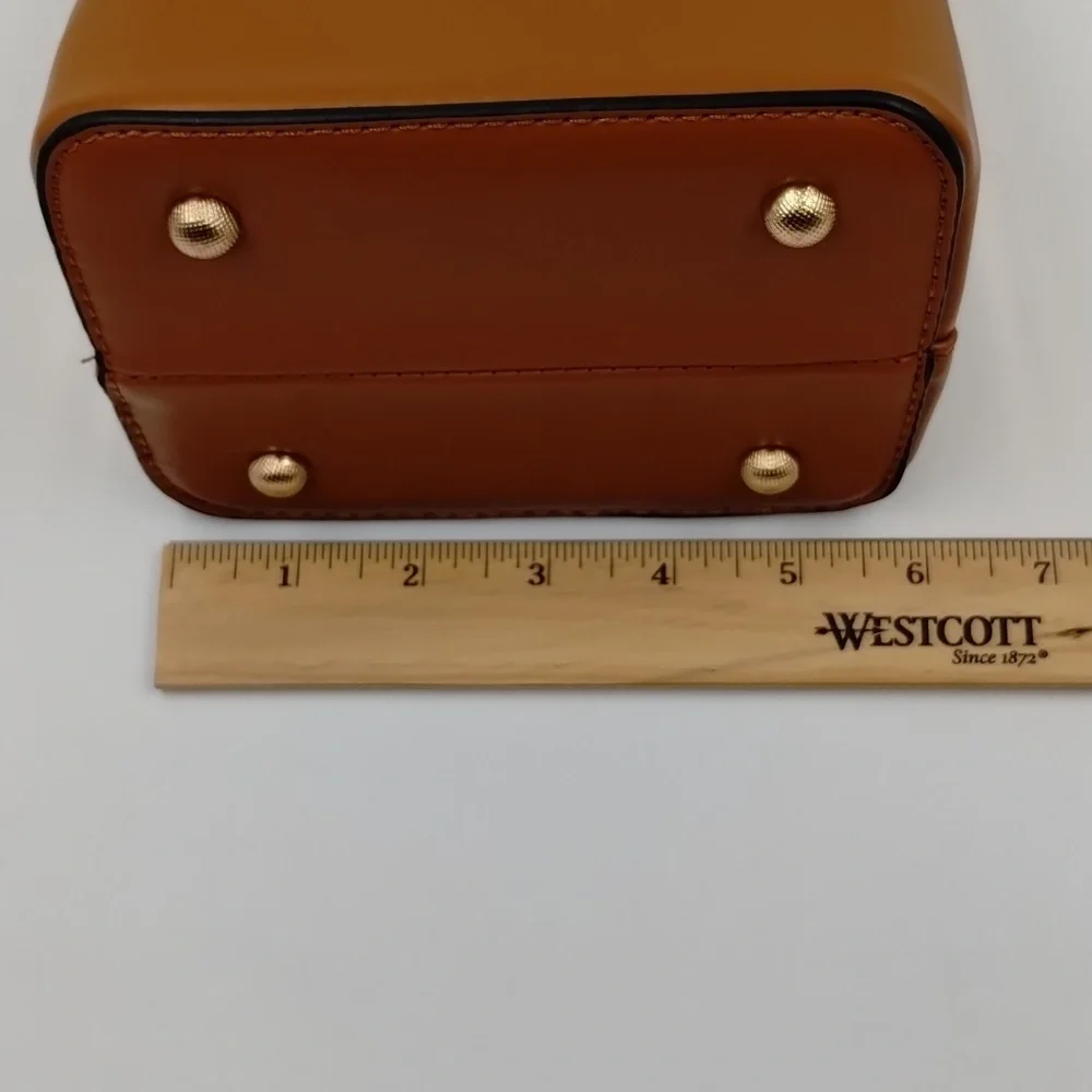 Sophisticated Brown Baby Bag with Gold Accents